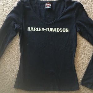 Top has chrome or silver lettering